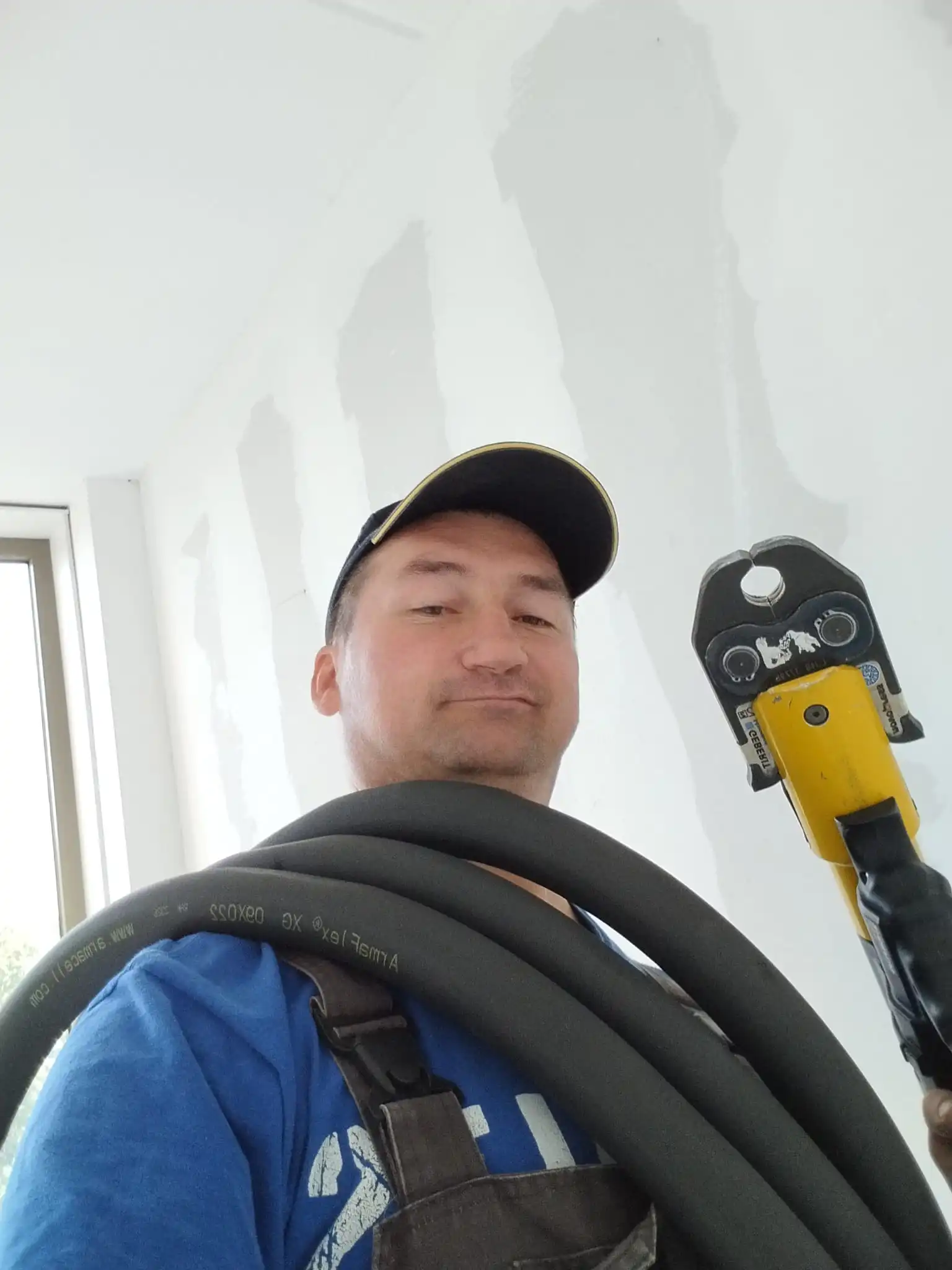 Contractor on site with tools and safety gear